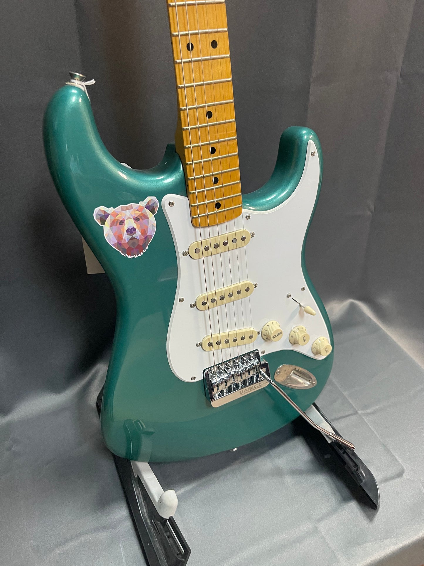 FENDER SQUIER TEAL GREEN STRAT W/ DELUXE BRIDGE AND GIG BAG